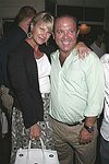 Marcy and Michael Warren at the after party for &quotFinding Neverland&quot at Savannah in Southampton on 8-29-04. photo by Rob Rich copyright 2004<br>516-676-3939<br>robwayne1@aol.com