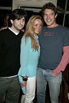  Jonathan Sherman,Caroline Berthet, & Jason Blum   at the after party for &quotFinding Neverland&quot at Savannah in Southampton on 8-29-04. photo by Rob Rich copyright 2004<br>516-676-3939<br>robwayne1@aol.com