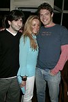  Jonathan Sherman,Caroline Berthet, & Jason Blum   at the after party for &quotFinding Neverland&quot at Savannah in Southampton on 8-29-04. photo by Rob Rich copyright 2004<br>516-676-3939<br>robwayne1@aol.com