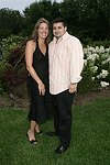 Adrienne and James Fauci at the  benefit for the NYU School of Medicine - Mental Illness Prevention Center hosted by Anna Anissimova at the Southampton residence of Denise Rich on August 14, 2004 at the Rich residence in Southampton, N.Y.<br>photo by Rob Rich copyright 2004 516-676-3939 robwayne1@aol.com