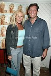 Edie Kirk and Kent Osmanski  on 5-28-04 at the Hampton Magazine Party at the Cabana in Southampton. photo by Rob Rich copyright 2004 <br>516-676-3939  robwayne1@aol.com