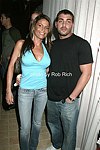  Andrea Somerville, and Joe Davino   on 5-28-04 at the Hampton Magazine Party at the Cabana in Southampton. photo by Rob Rich copyright 2004 <br>516-676-3939  robwayne1@aol.com