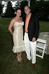 Dawn Zimmerman Hummel and John Hummel   at the 8th. Annual Orchid Ball  to benefit the Child Developement Center of the Hamptons on July 24, 2004 at the Villa Maria in Watermill. photo by Rob Rich copyright 2004 516-676-3939  robwayne1@aol.com