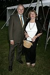 Jim & Ginny Comley at the 8th. Annual Orchid Ball  to benefit the Child Developement Center of the Hamptons on July 24, 2004 at the Villa Maria in Watermill. photo by Rob Rich copyright 2004 516-676-3939  robwayne1@aol.com