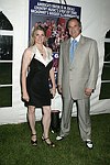  Bonnie Comley and Stewart Lane at the 8th. Annual Orchid Ball  to benefit the Child Developement Center of the Hamptons on July 24, 2004 at the Villa Maria in Watermill. photo by Rob Rich copyright 2004 516-676-3939  robwayne1@aol.com