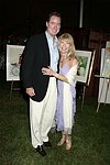 Matt and Regina Crehan  at the 8th. Annual Orchid Ball  to benefit the Child Developement Center of the Hamptons on July 24, 2004 at the Villa Maria in Watermill. photo by Rob Rich copyright 2004 516-676-3939  robwayne1@aol.com
