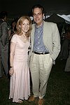 Shari and Ed Adler  at the 8th. Annual Orchid Ball  to benefit the Child Developement Center of the Hamptons on July 24, 2004 at the Villa Maria in Watermill. photo by Rob Rich copyright 2004 516-676-3939  robwayne1@aol.com