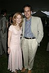 Shari and Ed Adler   at the 8th. Annual Orchid Ball  to benefit the Child Developement Center of the Hamptons on July 24, 2004 at the Villa Maria in Watermill. photo by Rob Rich copyright 2004 516-676-3939  robwayne1@aol.com