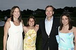 Robin Seegal, Mallory Seegal, Dick Alexander, and Hallie Seegal  at the 8th. Annual Orchid Ball  to benefit the Child Developement Center of the Hamptons on July 24, 2004 at the Villa Maria in Watermill. photo by Rob Rich copyright 2004 516-676-3939  robwayne1@aol.com