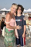 Jane and Mac Petrycki and at the annual Hamptons Clambake at Flying Point Beach in Watermill on 7-11-04<br>photo by Rob Rich copyright 2004 516-676-3939 robwayne1@aol.com