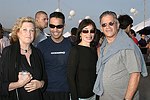 Maryellen Winston, Raven,Miguel  Gonzalez and Tony Vargas at the annual Hamptons Clambake at Flying Point Beach in Watermill on 7-11-04<br>photo by Rob Rich copyright 2004 516-676-3939 robwayne1@aol.com
