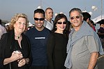 Maryellen Winston, Raven,Miguel  Gonzalez and Tony Vargas at the annual Hamptons Clambake at Flying Point Beach in Watermill on 7-11-04<br>photo by Rob Rich copyright 2004 516-676-3939 robwayne1@aol.com