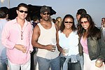 Frank Cilione, Kendall James, Tracey Brown, and Shamin Abas at the annual Hamptons Clambake at Flying Point Beach in Watermill on 7-11-04<br>photo by Rob Rich copyright 2004 516-676-3939 robwayne1@aol.com