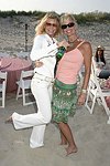 Jennifer Klein and Jane Petrycki at the annual Hamptons Clambake at Flying Point Beach in Watermill on 7-11-04<br>photo by Rob Rich copyright 2004 516-676-3939 robwayne1@aol.com