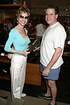 Leigh Brown and Dr. Elliot Jacobs at  the Hamptons Magazine/Cole Haan event in Easthampton on <br>6-26-04. photo by Rob Rich copyright 2004 516-676-3939 robwayne1@aol.com  112 12th. Ave, Sea Cliff, N.Y. 11579