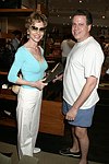 Leigh Brown and Dr. Elliot Jacobs at  the Hamptons Magazine/Cole Haan event in Easthampton on <br>6-26-04. photo by Rob Rich copyright 2004 516-676-3939 robwayne1@aol.com  112 12th. Ave, Sea Cliff, N.Y. 11579