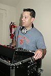 DJ Bobby Fayder at the Cole Haan event in Easthamtpon on 7-17-04<br>photo by Rob Rich copyright 2004  516-676-3939<br>robwayne1@aol.com