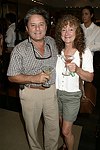 Michael and Marianne Kaufman at Swinging Saturday at Cole Haan in Easthampton on 8-14-04.  photo by Rob Rich copyright 2004 516-676-3939  robwayne1@aol.com