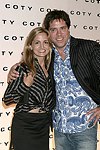 Andy Hilfiger and wife at the Coty 100th. Anniversary at the Museum of Natural History in Manhattan, N.Y. on September 12, 2004.<br>(photo by Rob Rich/ The Everett Collection)