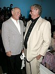 Barry Diller and Mike Nichols at the  Diane von Furstenberg fashion show  in Manhattan, N.Y. on September 12, 2004.<br>(photo by Rob Rich/ The Everett Collection)