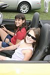 Leah and Harly Lane try out a Porsche at the Albert Einstein College of Medicine's Family Day Carnival at the Villa Maria in Watermill on 8-15-04<br>  photo by Rob Rich copyright 2004 516-676-3939  robwayne1@aol.com