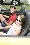Leah and Harly Lane try out a Porsche at the Albert Einstein College of Medicine's Family Day Carnival at the Villa Maria in Watermill on 8-15-04<br>  photo by Rob Rich copyright 2004 516-676-3939  robwayne1@aol.com
