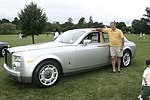 Producer Stewart Lane with the Rolls Royce 'Phantom' at the Albert Einstein College of Medicine's Family Day Carnival at the Villa Maria in Watermill on 8-15-04<br>  photo by Rob Rich copyright 2004 516-676-3939  robwayne1@aol.com