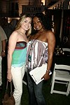 Ali Zweben and  Kelly Womack  at the live performance by Hip Hop superstar Fabolous and special guest DJ Premier  in Sag Harbor, N.Y. on September  4, 2004.  photo by Rob Rich copyright 2004 516-676-3939  robwayne1@aol.com