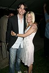 Jonathan Cheban and Lizzy Grubman  at the G&P Fundraiser at the Southampton Residence of Denise Rich on  July 10, 2004<br> photo by Rob Rich copyright 2004 516-676-3939 robwayne1@aol.com