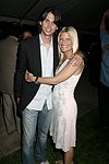 Jonathan Cheban and Lizzy Grubman  at the G&P Fundraiser at the Southampton Residence of Denise Rich on  July 10, 2004<br> photo by Rob Rich copyright 2004 516-676-3939 robwayne1@aol.com