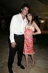 David Aaron and Daniella Rich  at the G&P Fundraiser at the Southampton Residence of Denise Rich on  July 10, 2004<br> photo by Rob Rich copyright 2004 516-676-3939 robwayne1@aol.com