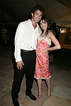 David Aaron and Daniella Rich  at the G&P Fundraiser at the Southampton Residence of Denise Rich on  July 10, 2004<br> photo by Rob Rich copyright 2004 516-676-3939 robwayne1@aol.com