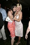 Daniella Rich and Lizzy Grubman  at the G&P Fundraiser at the Southampton Residence of Denise Rich on  July 10, 2004<br> photo by Rob Rich copyright 2004 516-676-3939 robwayne1@aol.com