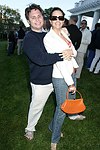 Jason Binn and Haley Lieberman Binn  at the God's Love We Deliver Mid Sumer Drinks party on 6-12-04 at the Southampton Estate of Don Burns and Gregg Connors  all photos by Rob Rich copyright 2004 516-676-3939