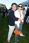 Jason Binn and Haley Lieberman Binn  at the God's Love We Deliver Mid Sumer Drinks party on 6-12-04 at the Southampton Estate of Don Burns and Gregg Connors  all photos by Rob Rich copyright 2004 516-676-3939