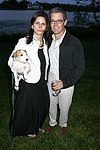 Desiree Gruber and Kyle MacLachlan at the God's Love We Deliver Mid Sumer Drinks party on 6-12-04 at the Southampton Estate of Don Burns and Gregg Connors  all photos by Rob Rich copyright 2004 516-676-3939