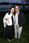 Desiree Gruber and Kyle MacLachlan at the God's Love We Deliver Mid Sumer Drinks party on 6-12-04 at the Southampton Estate of Don Burns and Gregg Connors  all photos by Rob Rich copyright 2004 516-676-3939