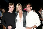 Chris Poore, Sophie Knight, and Christain Leone at the God's Love We Deliver Mid Sumer Drinks party on 6-12-04 at the Southampton Estate of Don Burns and Gregg Connors  all photos by Rob Rich copyright 2004 516-676-3939