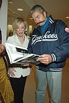 Ellen Graham and Leroy Neiman at the book signing of THE BAD AND THE BEAUTIFUL by photographer ELLEN GRAHAM at Bergdorf Goodman on October 14, 2004 in Manhattan, N.Y.<br> photo by Rob Rich copyright 2004<br>516-676-3939<br>robwayne1@aol.com