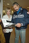Ellen Graham and Leroy Neiman at the book signing of THE BAD AND THE BEAUTIFUL by photographer ELLEN GRAHAM at Bergdorf Goodman on October 14, 2004 in Manhattan, N.Y.<br> photo by Rob Rich copyright 2004<br>516-676-3939<br>robwayne1@aol.com