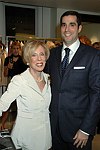 Ellen Graham and president of Bergdorf Goodman Jim Gold  at the book signing of THE BAD AND THE BEAUTIFUL by photographer ELLEN GRAHAM at Bergdorf Goodman on October 14, 2004 in Manhattan, N.Y.<br> photo by Rob Rich copyright 2004<br>516-676-3939<br>robwayne1@aol.com