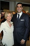 Ellen Graham and president of Bergdorf Goodman Jim Gold  at the book signing of THE BAD AND THE BEAUTIFUL by photographer ELLEN GRAHAM at Bergdorf Goodman on October 14, 2004 in Manhattan, N.Y.<br> photo by Rob Rich copyright 2004<br>516-676-3939<br>robwayne1@aol.com
