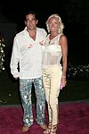 Alan and Karin Wilzig at the Heiress Records Launch Party on July 4, 2004at the Sony PlayStation 2 Estate in Bridgehampton, N.Y.  (Photo by Rob Rich/Everett Collection)