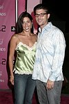 Shamin Abas Cilione and Frank Cilione at the Heiress Records Launch Party on July 4, 2004at the Sony PlayStation 2 Estate in Bridgehampton, N.Y.  (Photo by Rob Rich/Everett Collection)