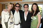 NEW YORK - MAY 29:Jennifer and Todd Klein, Dr. Howard Sobel, and Paige Boller at the Hampton's Magazine Party at Jason Binn's Southampton residence on May 29, 2004<br>(photo by Rob Rich/Getty Images)