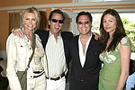 NEW YORK - MAY 29:Jennifer and Todd Klein, Dr. Howard Sobel, and Paige Boller at the Hampton's Magazine Party at Jason Binn's Southampton residence on May 29, 2004<br>(photo by Rob Rich/Getty Images)