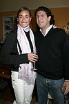 NEW YORK - MAY 29:Erin Henry and Michael Capponi at the Hampton's Magazine Party at Jason Binn's Southampton residence on May 29, 2004<br>(photo by Rob Rich/Getty Images)
