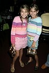 Lexi and Allie Kaplan at the 1st. Anniversary of Jean Luc East  on 9-5-04 in Easthampton. photo by Rob Rich copyright 2004<br>516-676-3939<br>robwayne1@aol.com