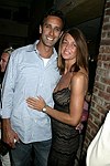 Eric Sadeh and Caroline Fox  at the 1st. Anniversary of Jean Luc East  on 9-5-04 in Easthampton. photo by Rob Rich copyright 2004<br>516-676-3939<br>robwayne1@aol.com