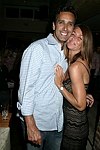 Eric Sadeh and Caroline Fox  at the 1st. Anniversary of Jean Luc East  on 9-5-04 in Easthampton. photo by Rob Rich copyright 2004<br>516-676-3939<br>robwayne1@aol.com